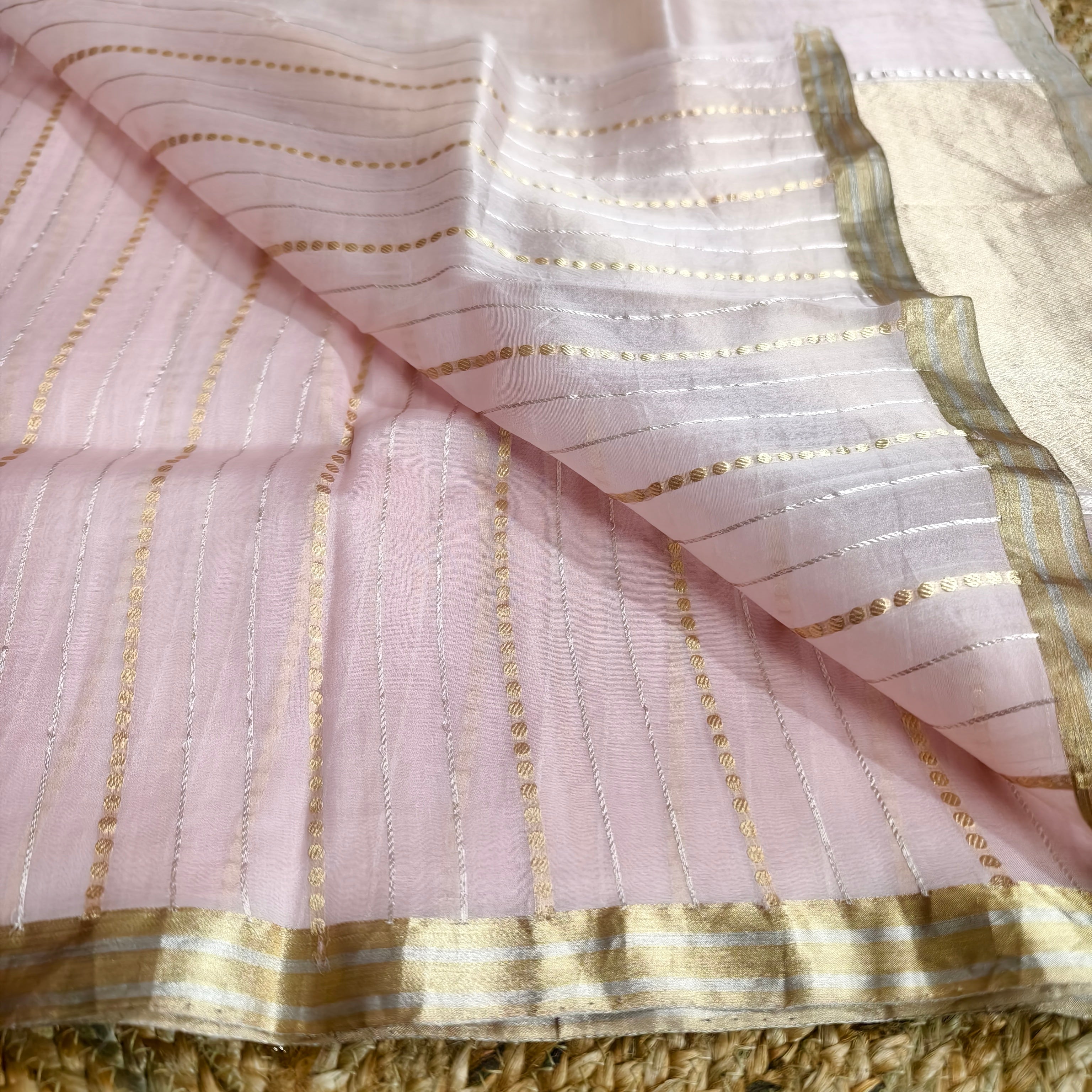 Baby pink silk organza with golden and silver zari stripes