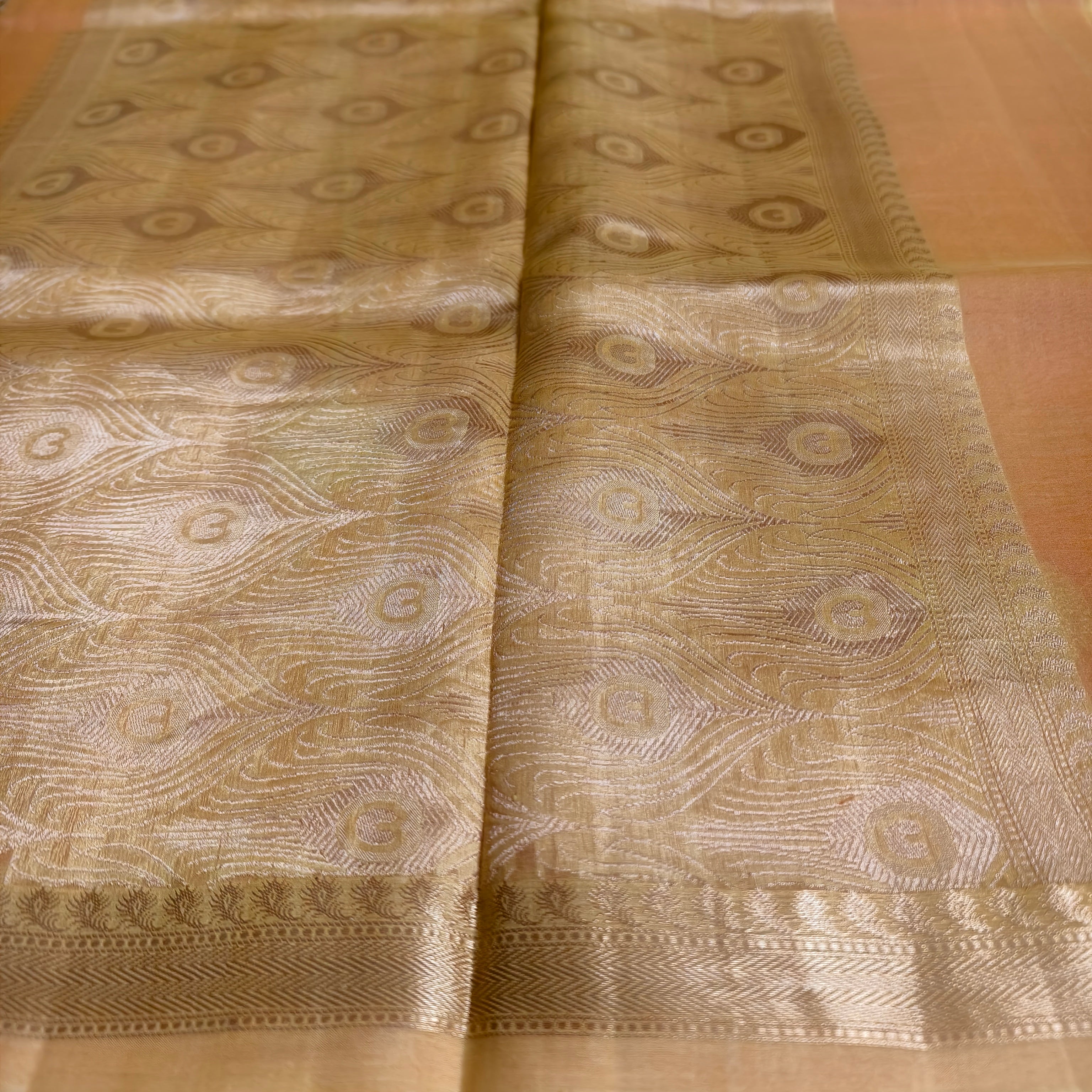 Half and half pale orange and dark orange silk organza saree