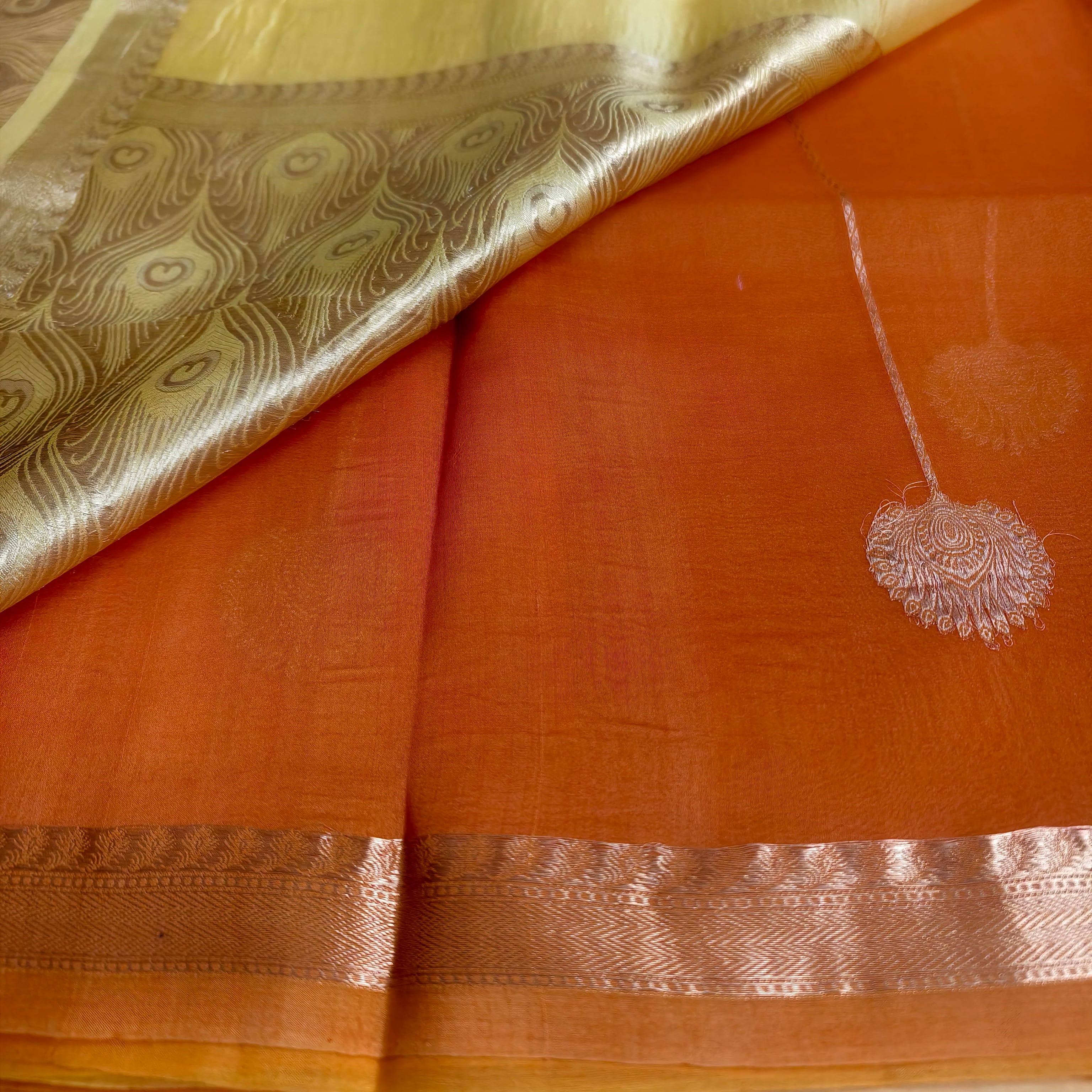 Half and half pale orange and dark orange silk organza saree