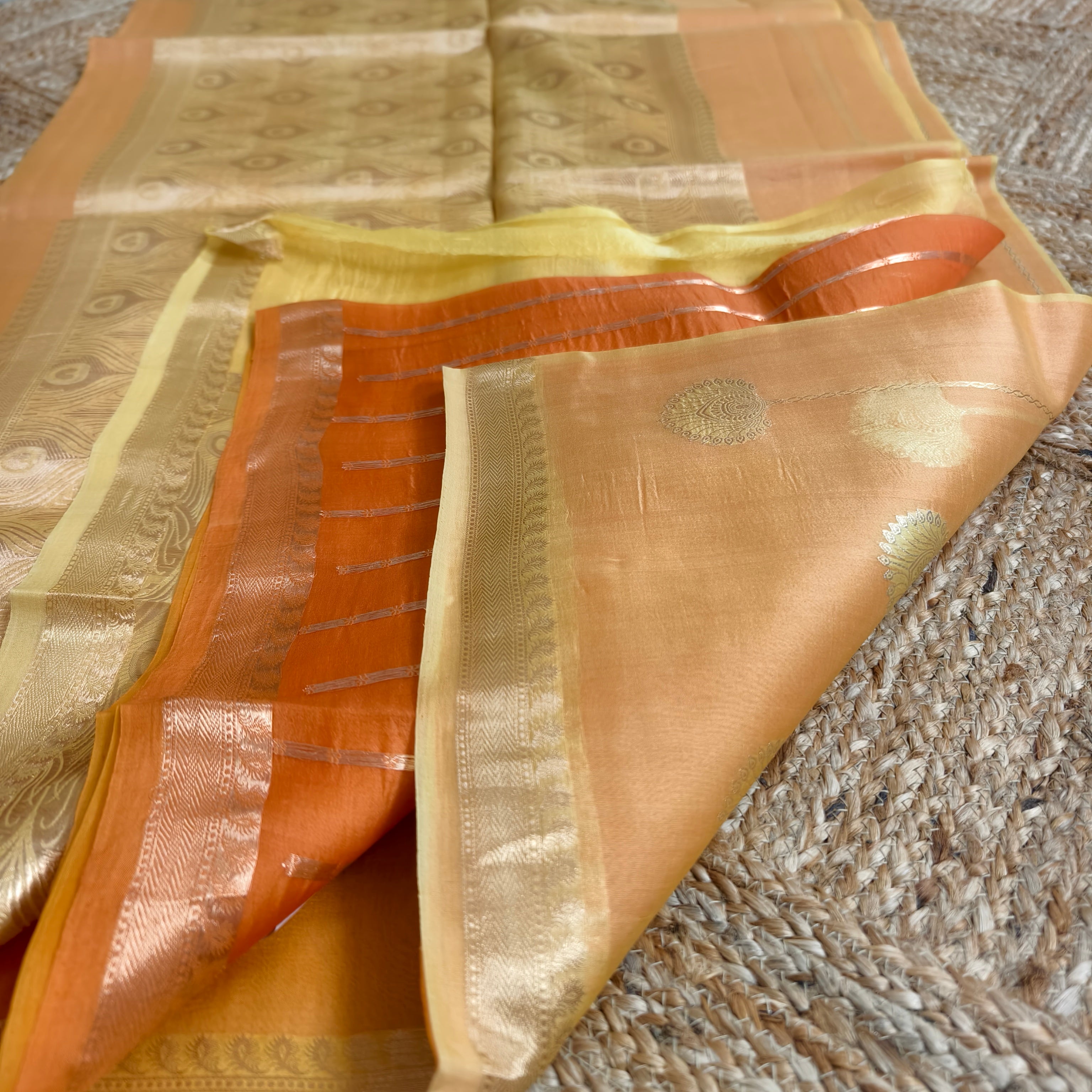 Half and half pale orange and dark orange silk organza saree