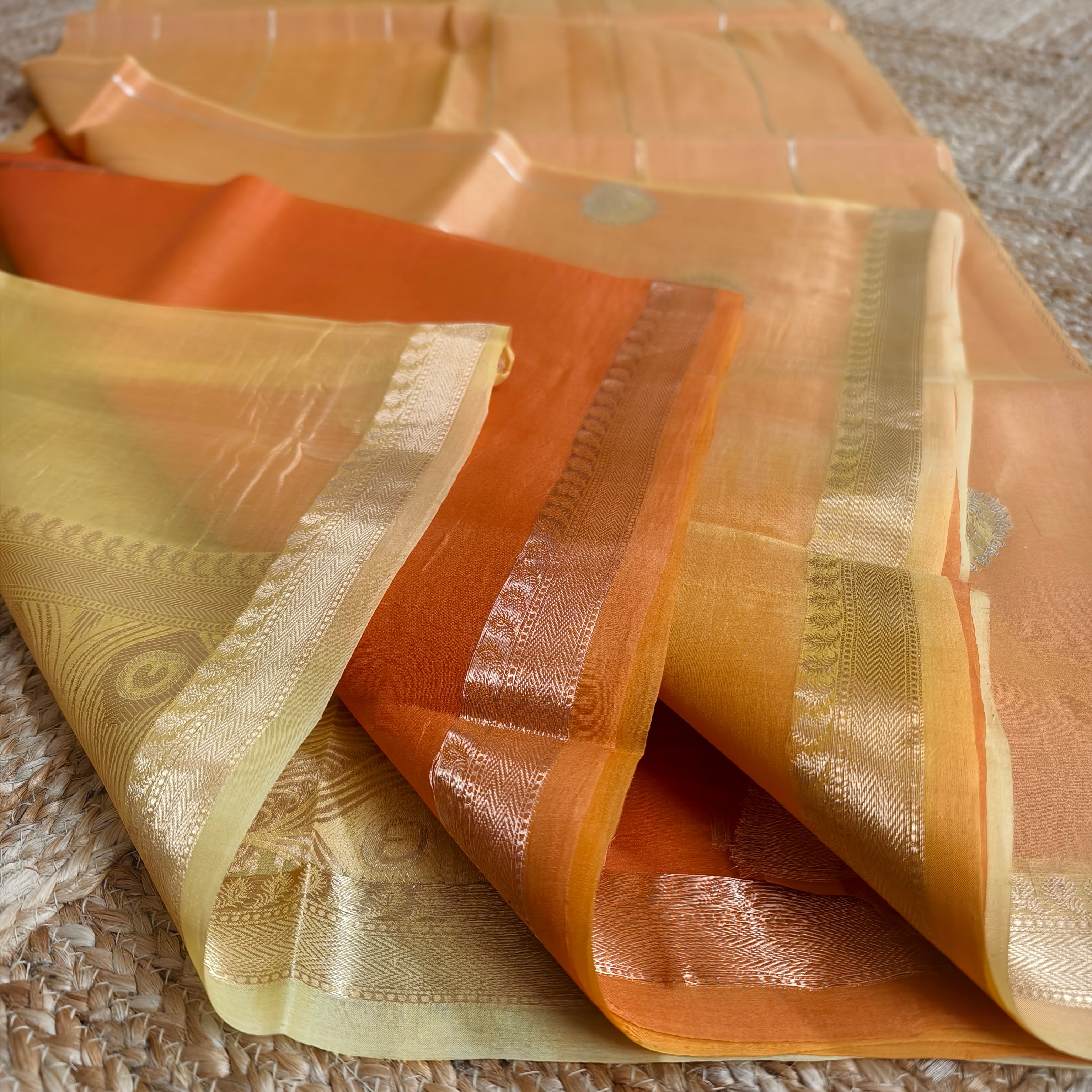Half and half pale orange and dark orange silk organza saree
