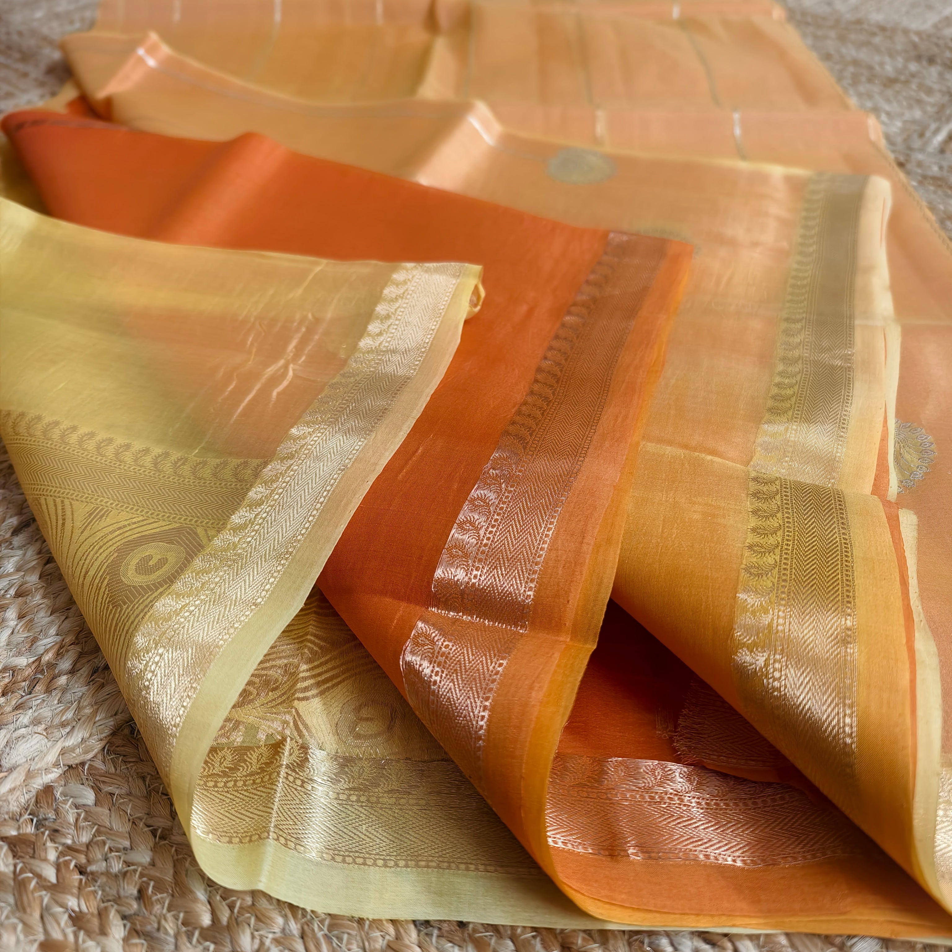 Half and half pale orange and dark orange silk organza saree