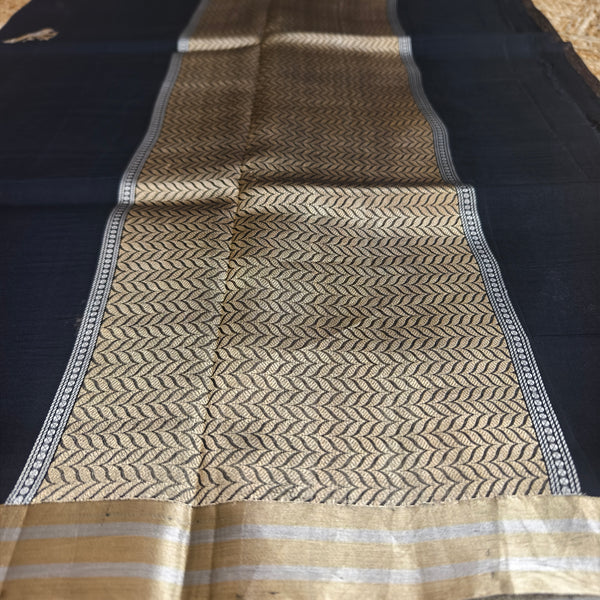 Black silk organza saree with small bird shaped weaving
