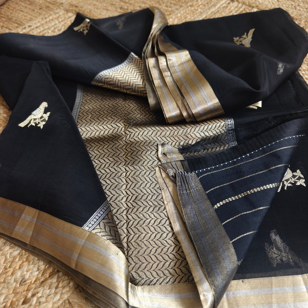 Black silk organza saree with small bird shaped weaving
