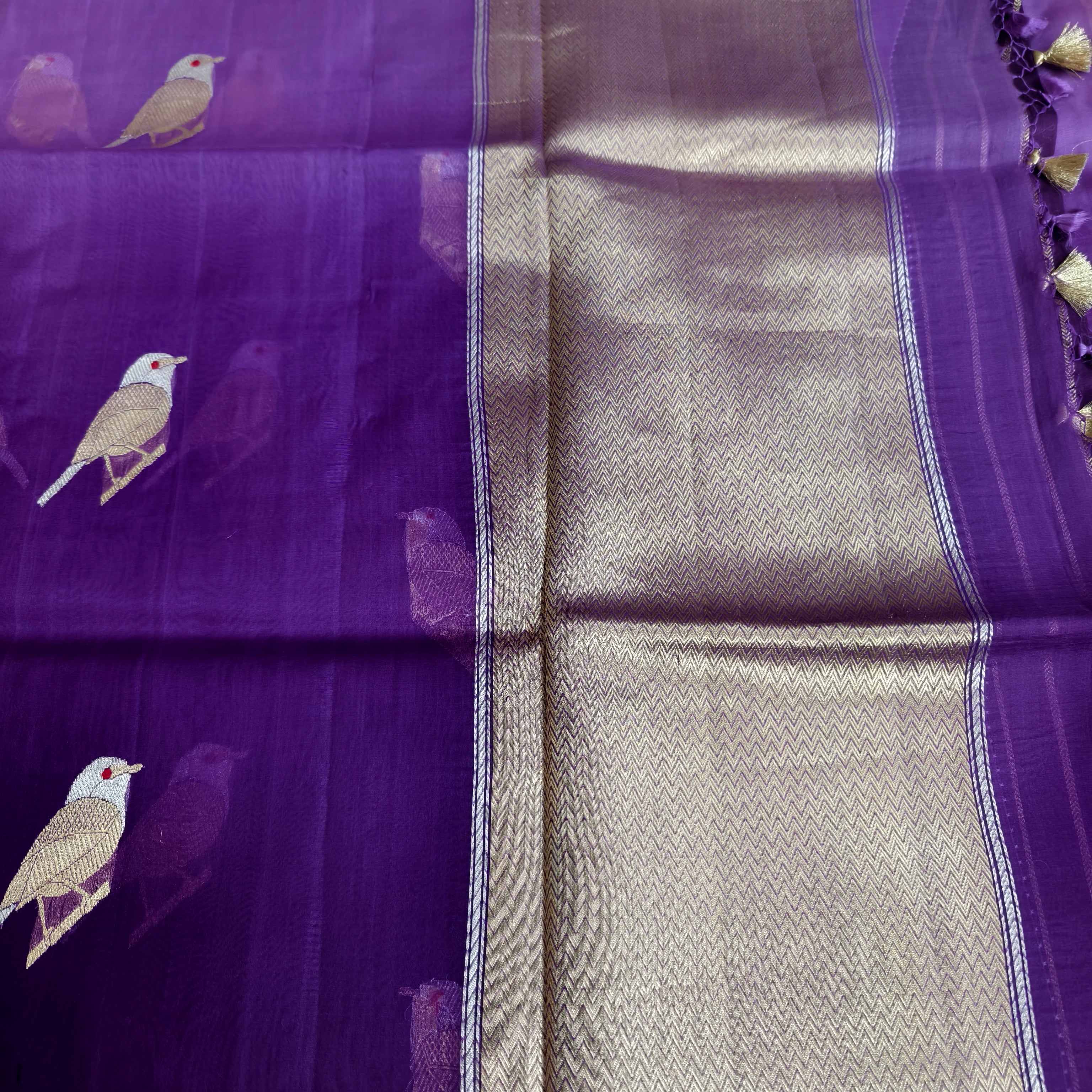 Shaded purple silk organza saree with small bird shaped weaving