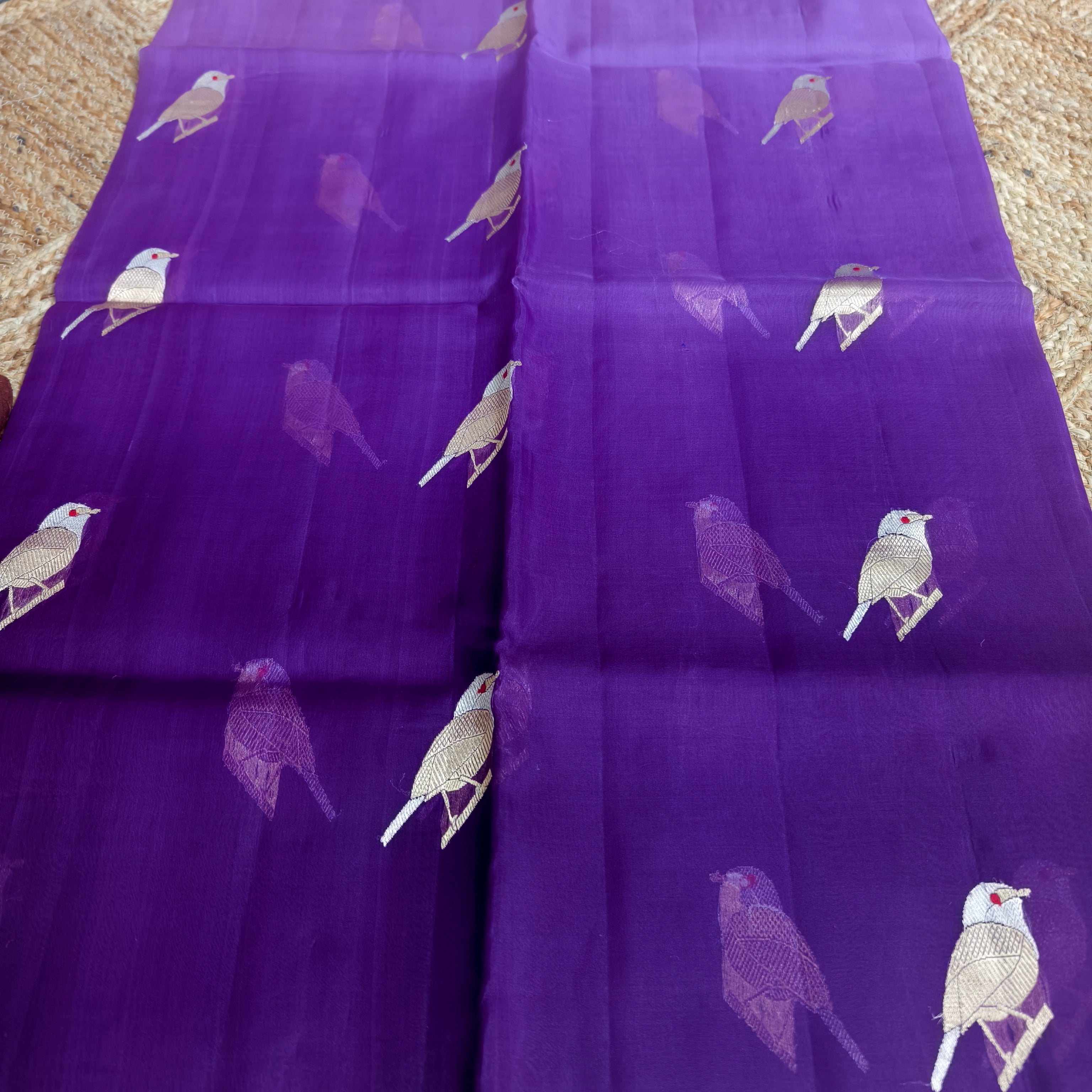 Shaded purple silk organza saree with small bird shaped weaving