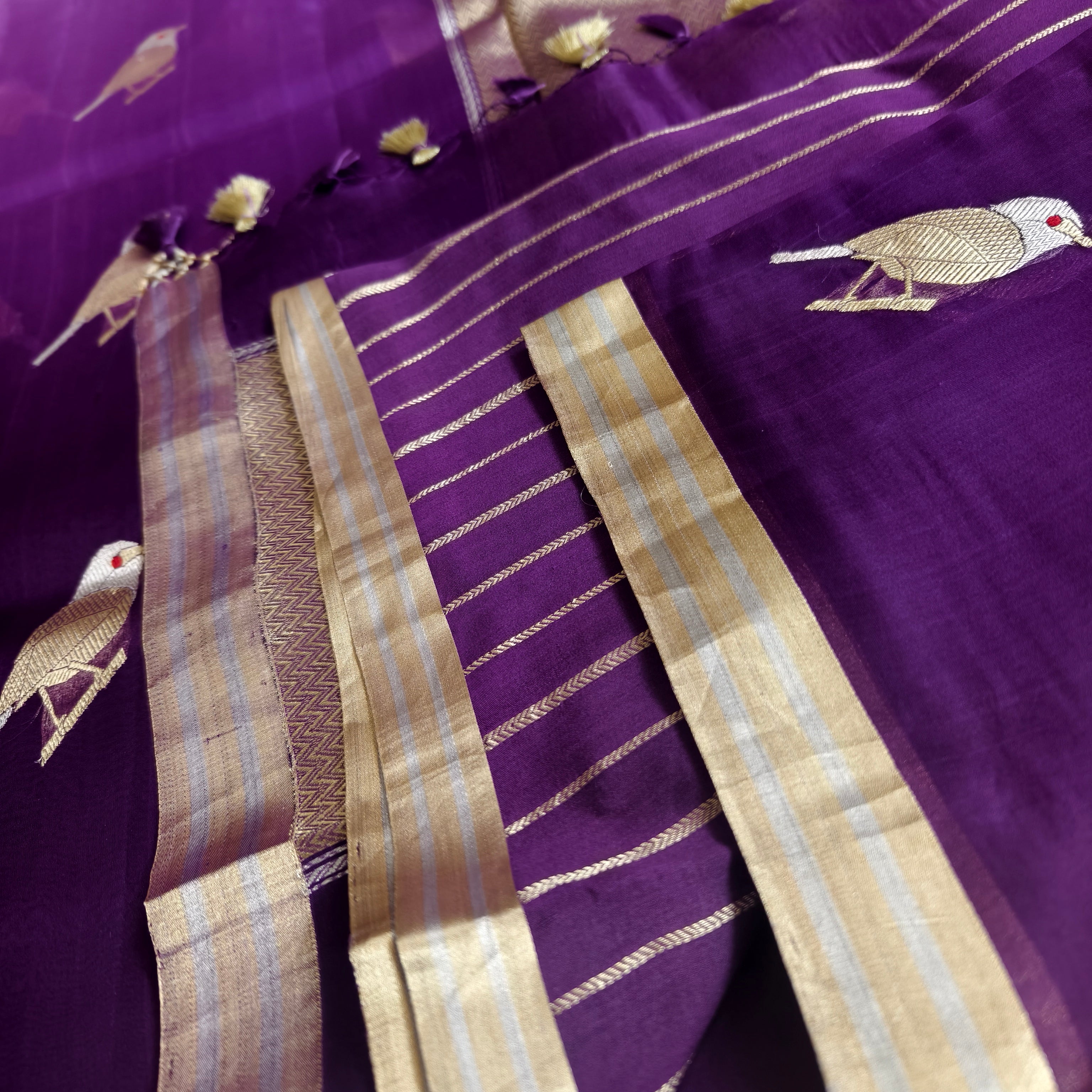 Shaded purple silk organza saree with small bird shaped weaving
