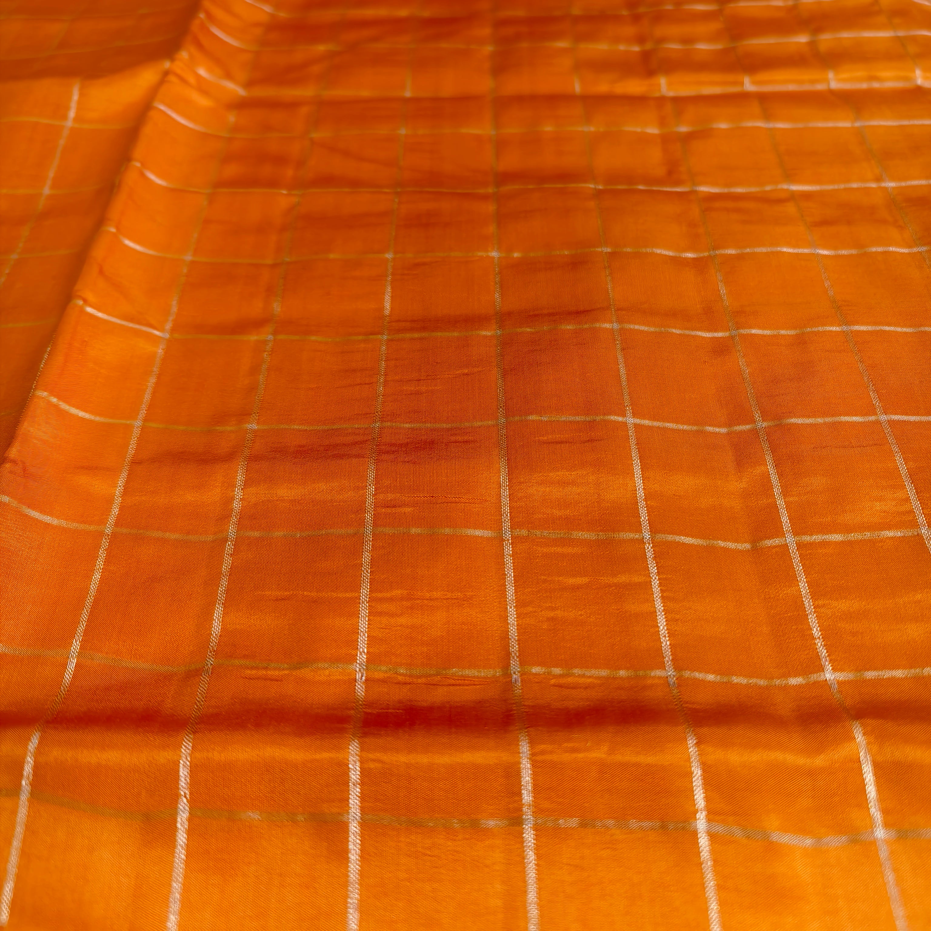 Orange katan raw mango silk Checkered saree