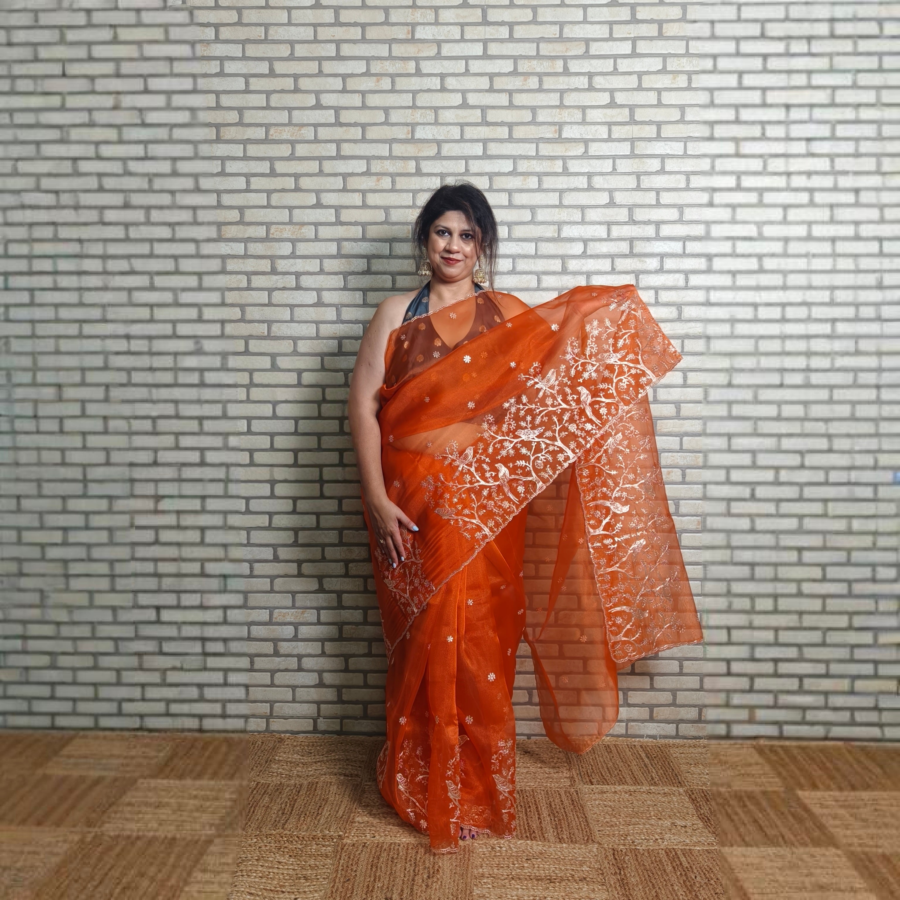 Vibrant orange tissue organza saree