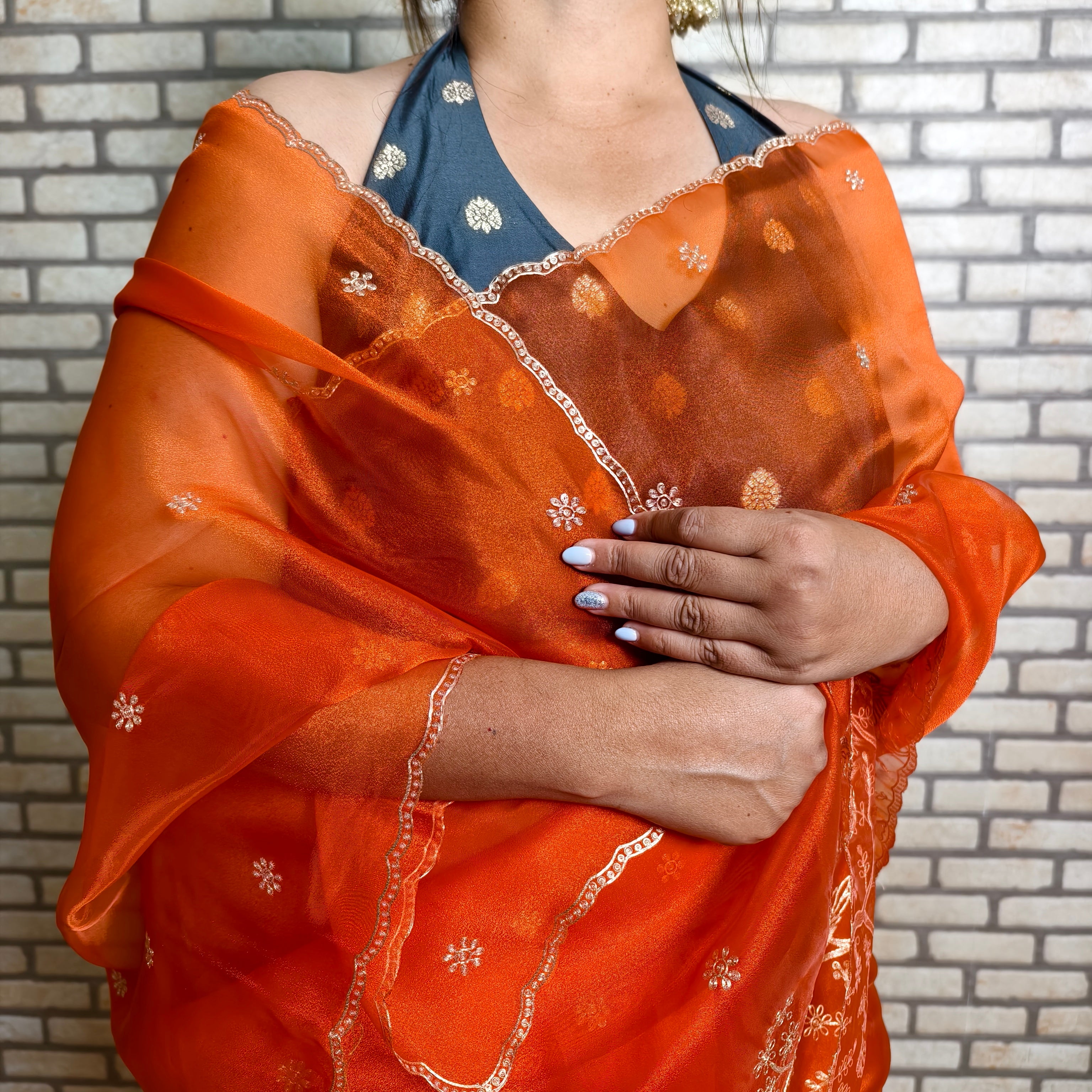 Vibrant orange tissue organza saree